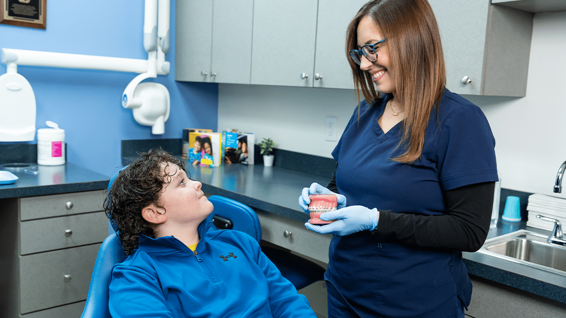 Hygienist With Patient